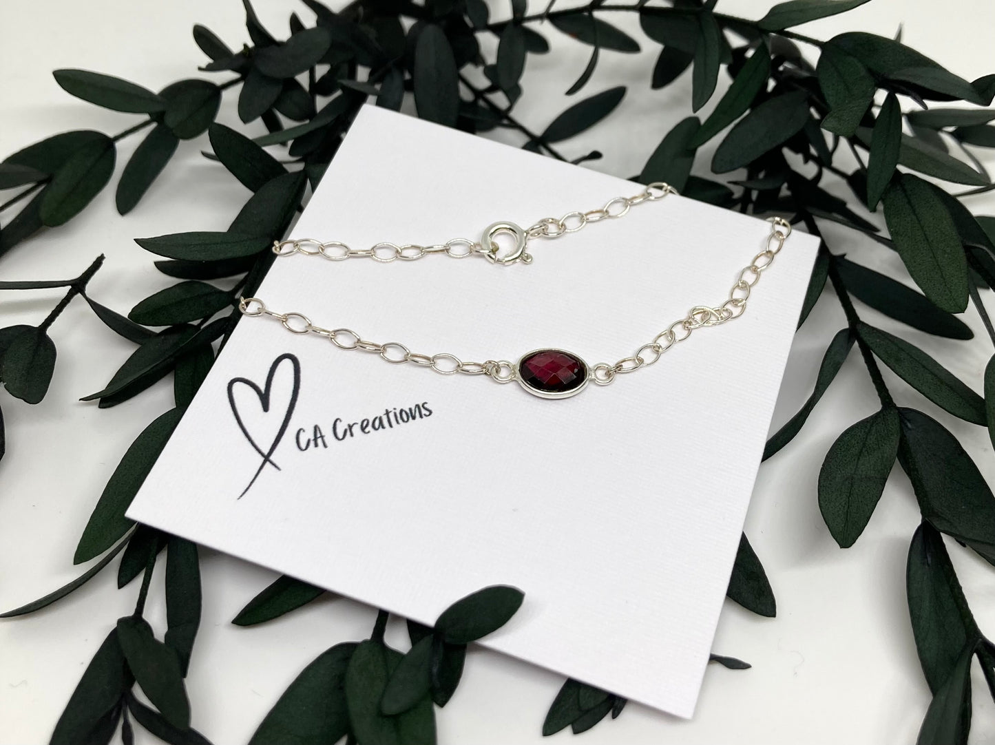 Classics - Garnet Oval Charm on Bracelet