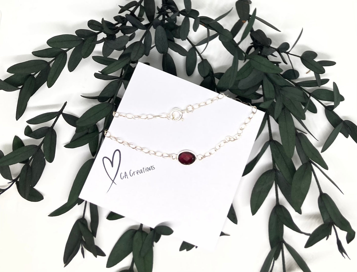 Classics - Garnet Oval Charm on Bracelet